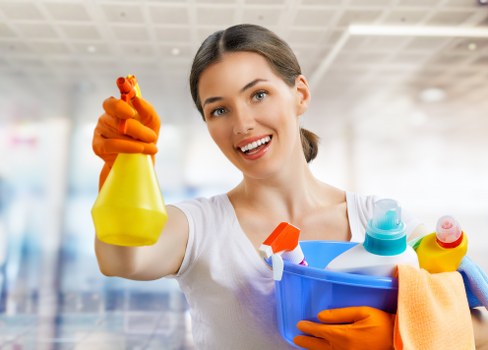 Office cleaning team working in a Shepherdsbush workplace reception area