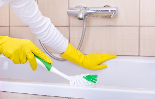 Professional cleaners focusing on kitchen deep cleaning in Shepherds Bush